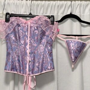 Lovely Pink & Bluish Lavender Corset
Size Small with matching panty NIB